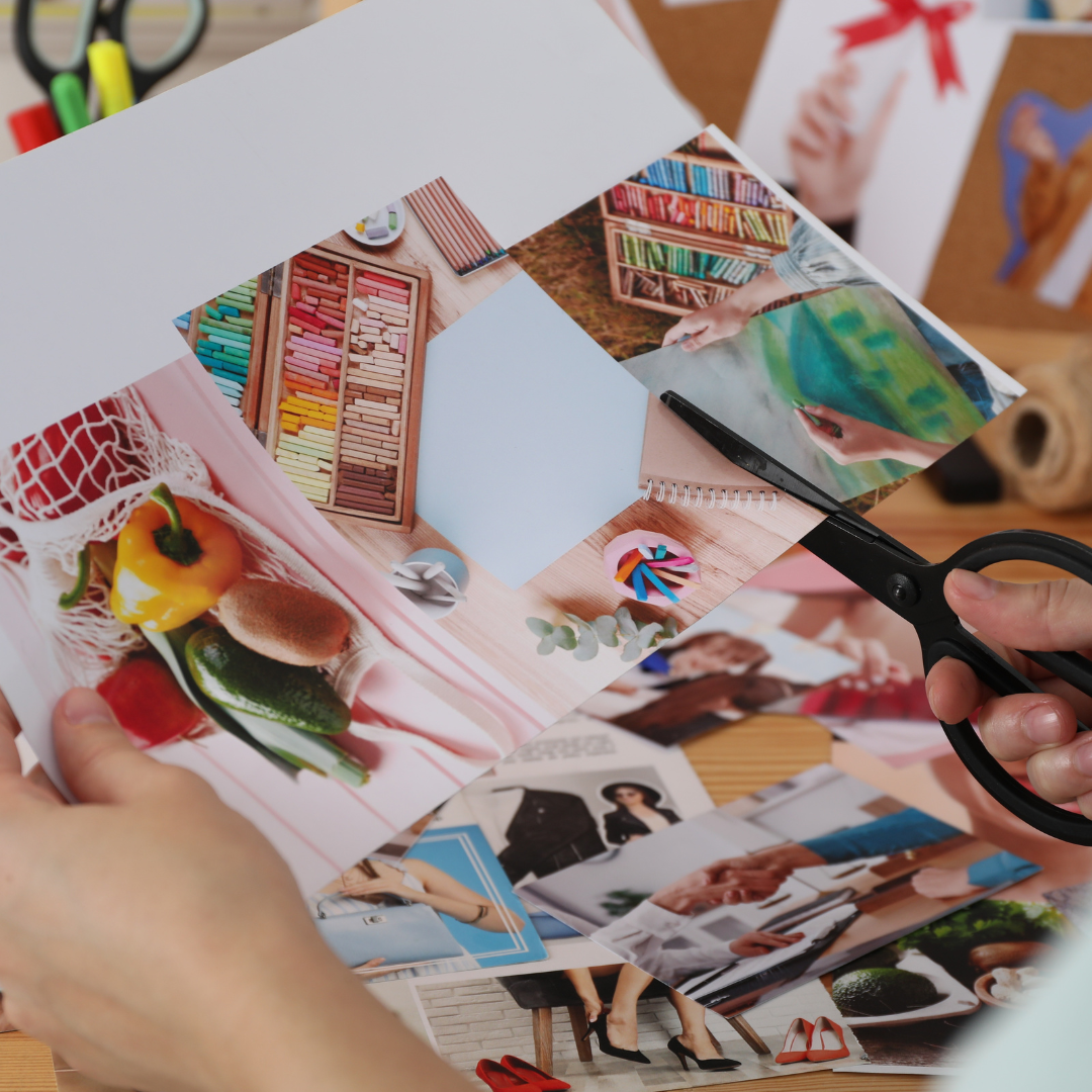 Someone cutting out snippets from a magazine.